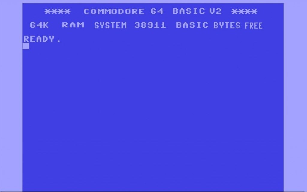 Čuveni desktop Commodorea 64 sa fotografijom neba bez oblaka na wallpaperu
