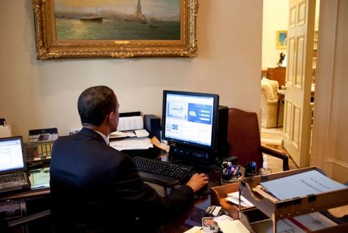 0519-0908-1500-0413_african_american_businessman_working_on_a_computer_in_an_office_m